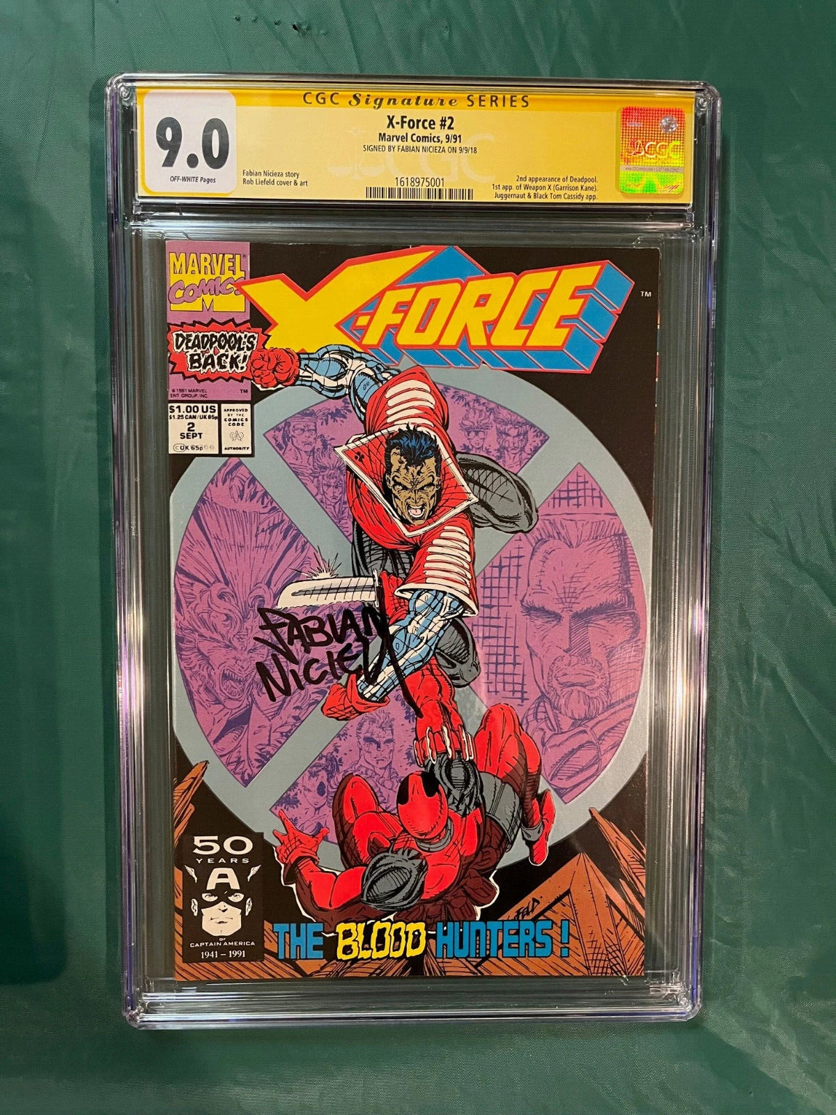 X-Force #2 1st Appearance of Weapon X (Garrison Kane) 2nd Appearance of Deadpool. Black Tom Cassidy Appearance, CBCS 9.0 Signed by Rob Liefeld